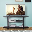 HOMCOM - Meuble tv bas table basse a roulettes en panneaux de particules noir - vignette