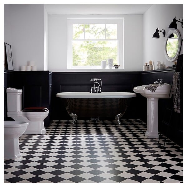 PLANETE BAIN - Baignoire îlot Charly noire avec pieds patte d'aigle chrome - large