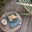 OVIALA - Table basse de jardin ronde en métal taupe 50 cm - Palavas - vignette
