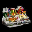FEERIC LIGHTS & CHRISTMAS - Village de Noël lumineux, animé et musical Père Noël  et Lutins - vignette