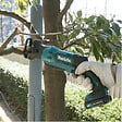 MAKITA - Scie sabre 10.8 V CXT -  - avec 2 batteries 12V 4.0 Ah - chargeur - MakPac - JR103DSMJ - vignette