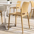 OVIALA - Chaise de terrasse ajourée en plastique jaune clair - Riga - vignette