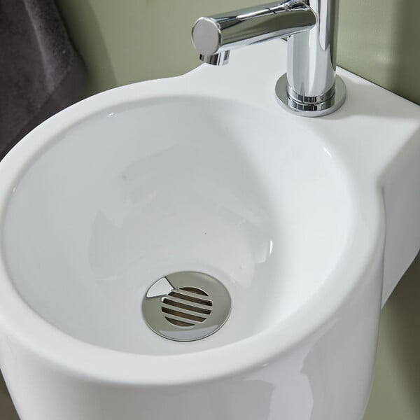 PLANETE BAIN - Bonde fixe de vidage pour lave-mains sans trop plein - écoulement libre - Grille laiton chromé - large