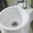 PLANETE BAIN - Bonde fixe de vidage pour lave-mains sans trop plein - écoulement libre - Grille laiton chromé - vignette