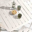 OVIALA - Table carrée de terrasse (70x70cm) blanche - Almada - vignette