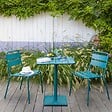 HESPERIDE - Table de jardin carrée "Phuket" bleu canard 2 places en acier traité époxy - vignette