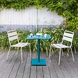 HESPERIDE - Table de jardin carrée "Phuket" bleu canard 2 places en acier traité époxy - vignette