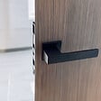 SECURY-T - Poignées de porte sur rosace noir mat - Modèle Mathilda Bec de cane, sans trou - vignette