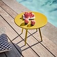 OVIALA - Table basse de jardin ronde en métal jaune 40 cm - Palavas - vignette