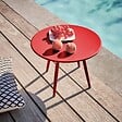 OVIALA - Table basse de jardin ronde en métal rouge 40 cm - Palavas - vignette