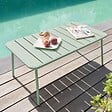 OVIALA - Table basse de jardin acier vert sauge 90 x 50 cm - Palavas - vignette