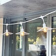 LUMISKY - Guirlande connectable CHIC CAGE Blanc 10 ampoules E27 6M - vignette
