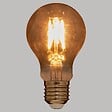 ATMOSPHERA - Ampoule LED "Standard" ambre D6cm E27 - vignette