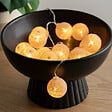 ATMOSPHERA - Guirlande LED 16 boules pile rose clair L255cm - vignette