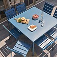 OVIALA - Ensemble table de jardin et 8 chaises en métal bleu pacific - Palavas - vignette