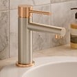ESSEBAGNO - Envol mitigeur lavabo bas façon inox et or rose - vignette