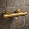 ESSEBAGNO - Carra mitigeur douche thermostatique or brossé - vignette