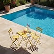OVIALA - Table de jardin pliante bistrot 60 cm en acier jaune - Rome - vignette