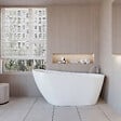 AICA SANITAIRE - Baignoire îlot ovale design acrylique pour salle de bain 150x72x73cm Blanc brillant - vignette