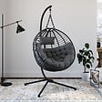ID MARKET - Fauteuil rond suspendu ajouré effet rotin gris avec coussin gris - vignette