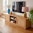 OVIALA - Meuble TV suspendu en bois 2 portes en rotin L160 cm bois clair  - Walter - vignette