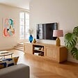 OVIALA - Meuble TV suspendu en bois 2 portes en rotin L160 cm bois clair  - Walter - vignette