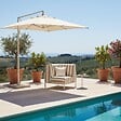 OVIALA - Fauteuil d'angle rayé pour salon de jardin modulable tissu beige - Patio - vignette