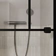 AURLANE - Porte de douche Pivotante 90x180 cm Sérigraphie Noire Motif Brique - Verre Anticalcaire 8mm - vignette