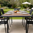 CONCEPT USINE - Table de jardin extensible 180 cm en aluminium et bois d'eucalyptus NIDO - vignette