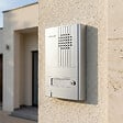 AIPHONE - Platine saillie 1 bouton avec Façade aluminium. epaisseur 22mm. - vignette