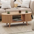 ID MARKET - Table basse ovale ROMIE 100 cm 2 portes coulissantes lattes tasseau bois coloris chêne - vignette