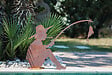 DECORIALE - Garcon pecheur métal rouille sur socle 90xh60cm - vignette