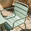 OVIALA - Ensemble table de jardin carrée et 2 fauteuils acier vert sauge - Palavas - vignette