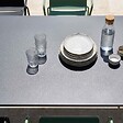 OVIALA - Ensemble table de jardin et 8 fauteuils en métal vert sauge et gris - Palavas - vignette