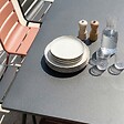 OVIALA - Ensemble table de jardin et 8 chaises en métal gris et argile - Palavas - vignette