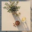 OVIALA - Table de jardin carrée en métal ivoire 70cm - Palavas - vignette