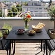OVIALA - Ensemble table de jardin carrée et 2 fauteuils acier 70 cm noir - Palavas - vignette