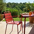 OVIALA - Ensemble table de jardin et 4 fauteuils en métal rouge - Palavas - vignette