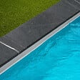 RO'MA NATURE - Margelle de piscine Ardoise Noire Grenaillée 60x30x3 cm Bord 1/2 Rond (à l'unité) - vignette