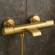 ESSEBAGNO - Carra mitigeur bain-douche thermostatique or brossé - vignette