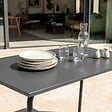 OVIALA - Table de jardin en acier 6 places 120 cm gris - Palavas - vignette