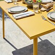 OVIALA - Table de jardin en acier 6 places 120 cm jaune  - Palavas - vignette