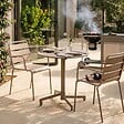 OVIALA - Ensemble table de jardin et 2 fauteuils en métal taupe - Palavas - vignette