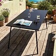 OVIALA - Table de jardin rectangulaire en acier 8 places 180 cm noir - Palavas - vignette