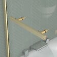 AURLANE - Pare baignoire Rabattable avec porte-serviette 70x120 cm - Profilé Or Brossé - Verre 4 mm - vignette