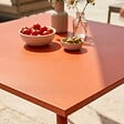 OVIALA - Table de jardin carrée en métal 8 places 120 cm orange - Palavas - vignette