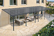 CAZEBOO - Cazeboo Pergola/Carport adossée 30m² KLEO 10x3 m gris - toit terrasse en aluminium et polycarbonate - vignette