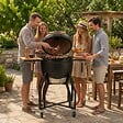 INTEC - Barbecue à charbon de bois Céramique Kamado Noir 2 zones de cuisson Grill & Fumoir Ø56cm - Barbecue mobile + 2 tablettes INTEC - vignette