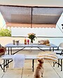 INNOVAXE - Table pliante en résine avec poignée de transport - vignette