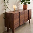 OVIALA - Buffet effet bois 4 portes L 180 cm bois foncé - Harlan - vignette